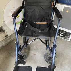 Wheelchair with comfort cushion  & footrests