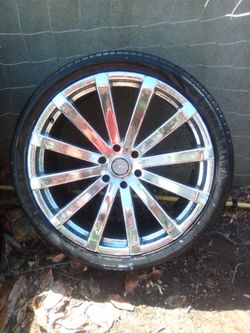 24 inch rims, Cadillac, Velocity brand.