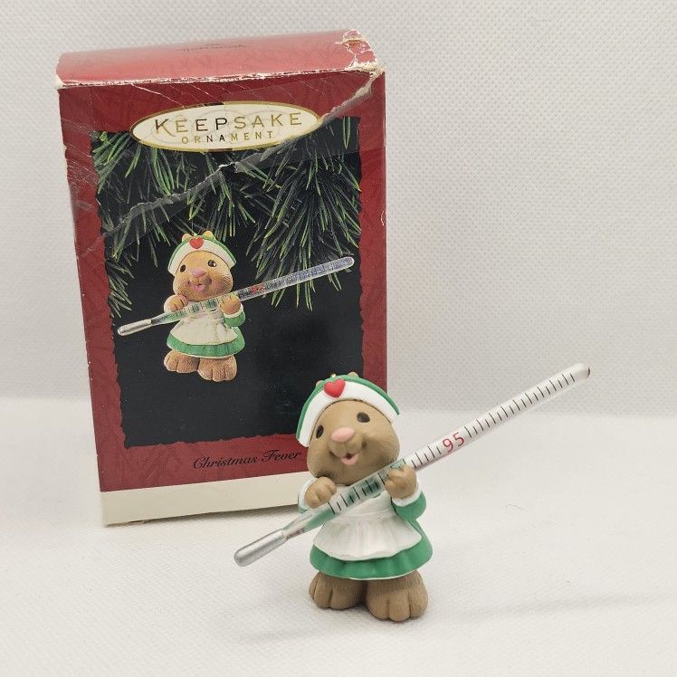 Hallmark Keepsake Christmas fever Ornament nurse doctor thermometer sick
1995
Ornament is in great condition, no flaws
Box has some storage wear
Smo