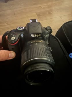 Nikon d5100 camera with lens and bag