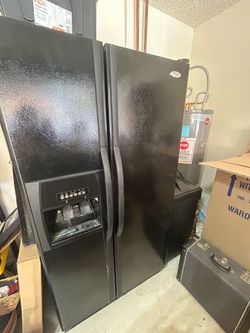 Whirlpool double door fridge/freezer. Ice maker and water dispenser in door. Works great! $90