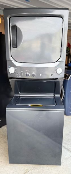 Brand new GE stacked washer 3.8 Cu.Ft. And  dryer 5.9Cu.Ft. Capacity.
