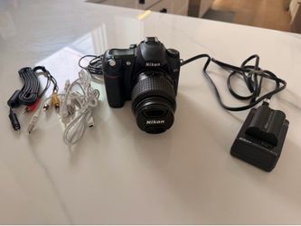 Nikon D50 SLR camera with lens and charger