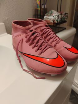 Pink and Orange Nike Mercurials Academy