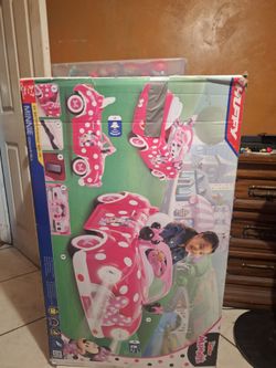 Minnie Mouse convertible pink car/Age 3-7.   Weight 65 lbs.