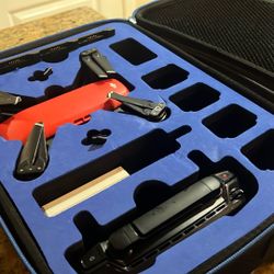 DJI Spark; Lava red; Comes With Case, Extra propellers, Propeller guards AND MORE