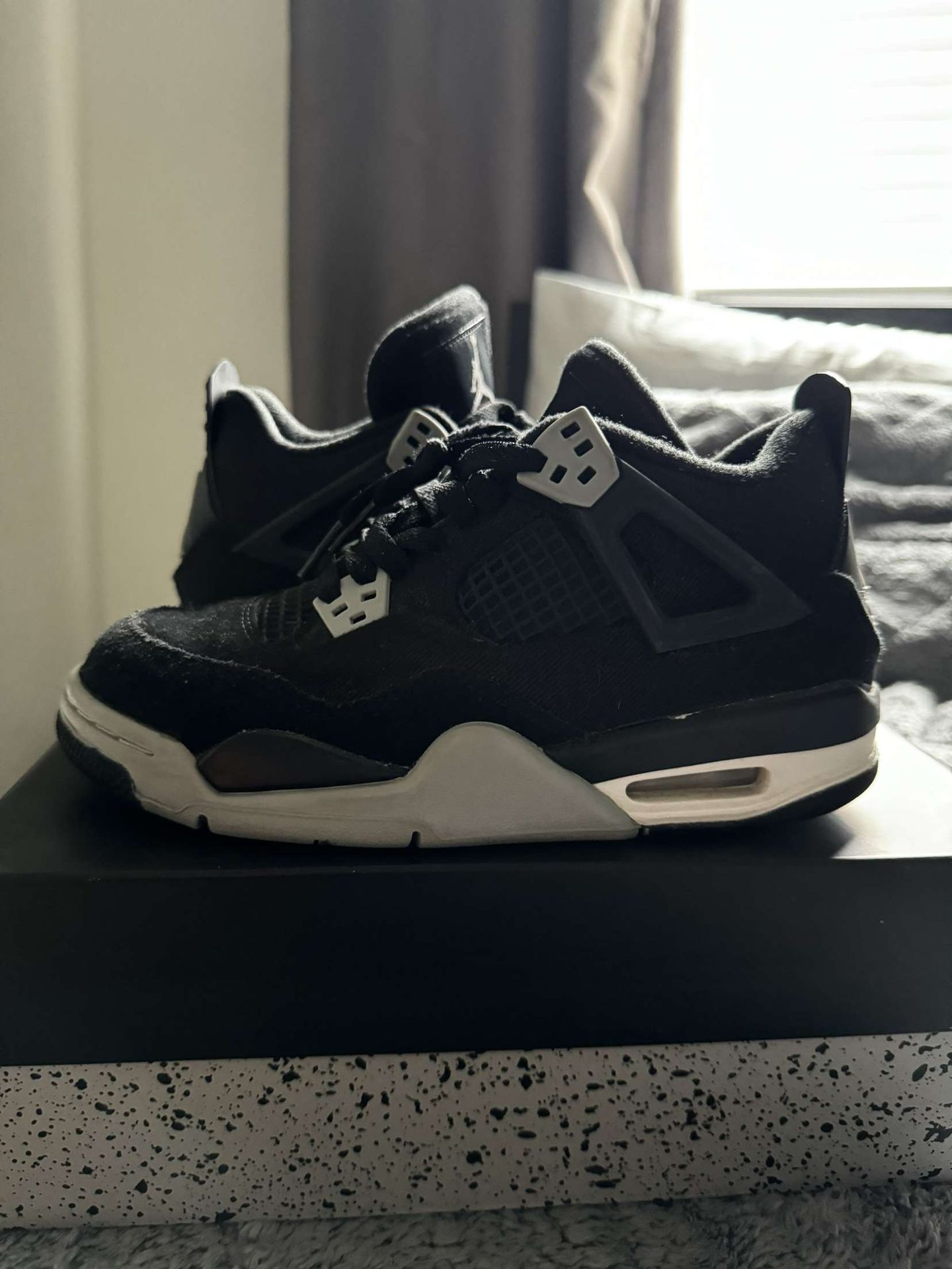 Black canvas jordan 4