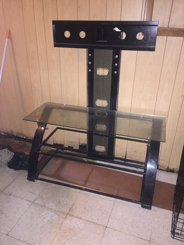 Black metal Tv stand wit glass shelf