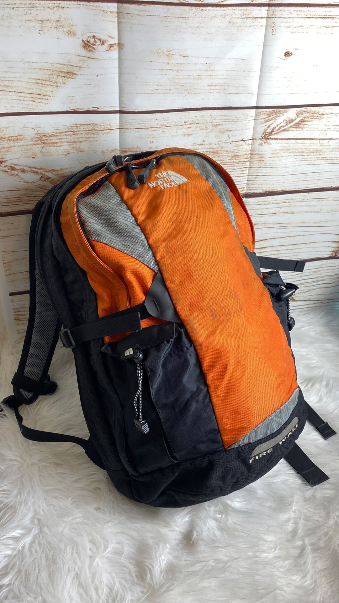 The north face “fire wall” hiking backpack.