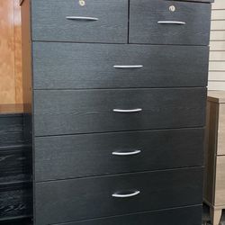 Black chest of drawers with double drawer locks