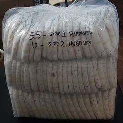 61 Huggies Diapers, Sizes 1&2