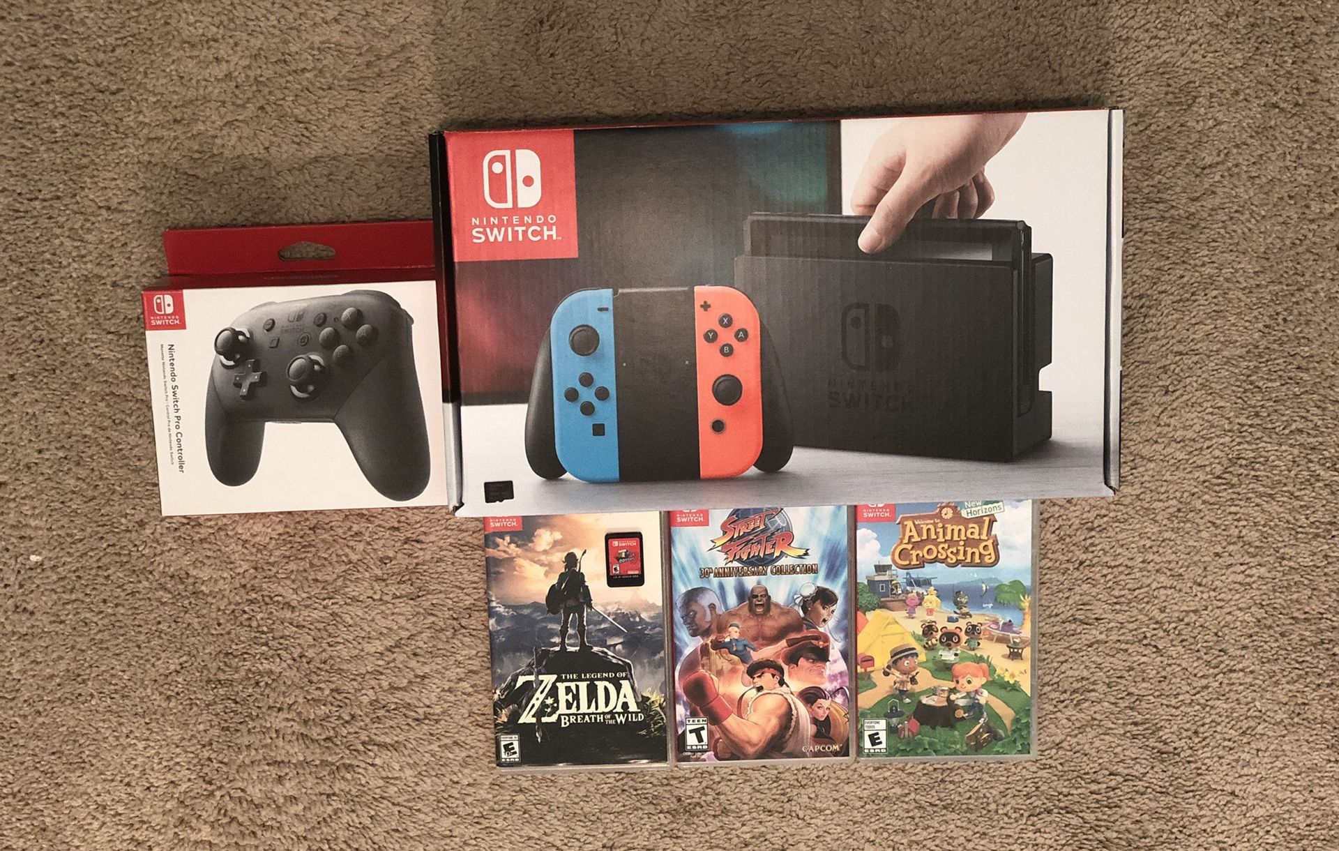 Nintendo Switch + 4 Big Games + Pro controller + FREE 128GB SD CARD and Carrying Case