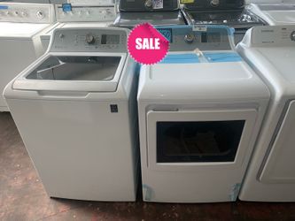 NEW scratch and dent GE top load washer and dryer set