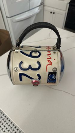 Eclectic license plate clutch