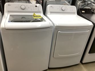 LG 4.5 cu.ft. Top Load Washer and 7.3 cu.ft. Electric Dryer Set New Scratch and Dent