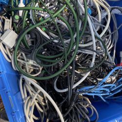 Box of computer cables and Computer Mice