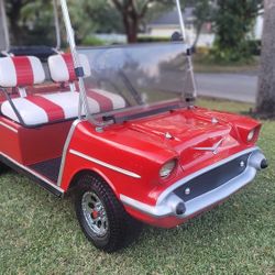 Custom 57 Chevrolet Bell-air Golf Cart body kit in a 48v aluminum frame club car ds.