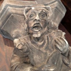 Antique Heavy jester or minstrel wall shelf plant stand