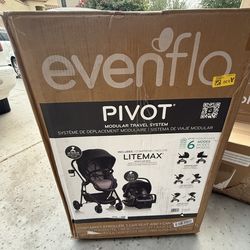 NEW! Evenflo pivot travel system