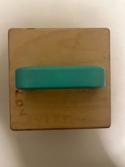 Lovevery Lock Box, a Montessori-inspired wooden activity cube designed for toddlers