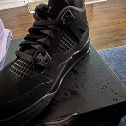 Brand new black Jordan 4’s Size 2.5