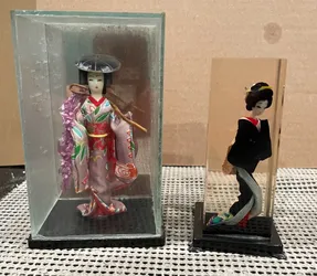 2 MINI JAPANESE GEISHA GIRL IN GLASS CASE & 1 IN CLEAR LUCITE ACRYLIC BLOCK