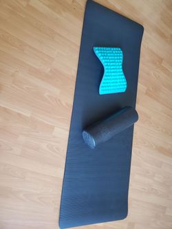Yoga/stretching mat. Foam roller. Back stretcher device.