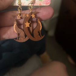 Handcrafter's Carved Wood Wolf Howling at the Moon Earrings on Hand Carved Hanger