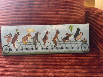 Whimsical dog biking art piece