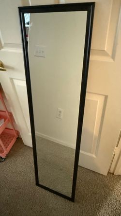 Mirror with holes in corners to screw to wall