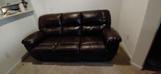 Brown Reclining Faux Leather Couch
