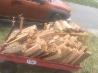 A large cart full of firewood for 25 bucks or two carts for40 bucks