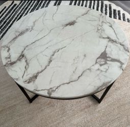 Round marble looking coffee table
