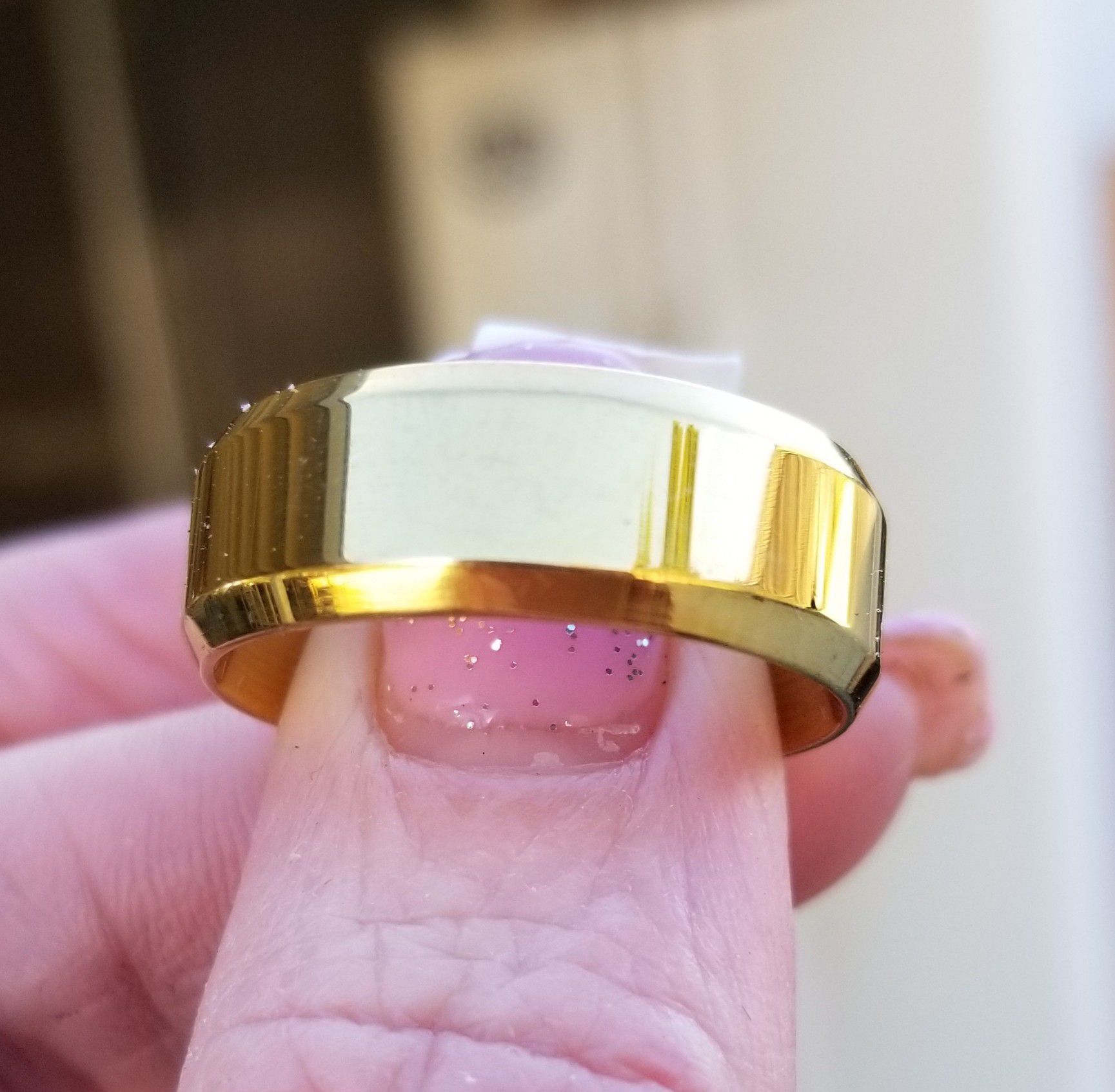 Gold over stainless steel wedding band.... size 10
