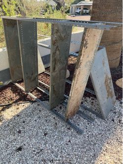 Multiple steel shelving units