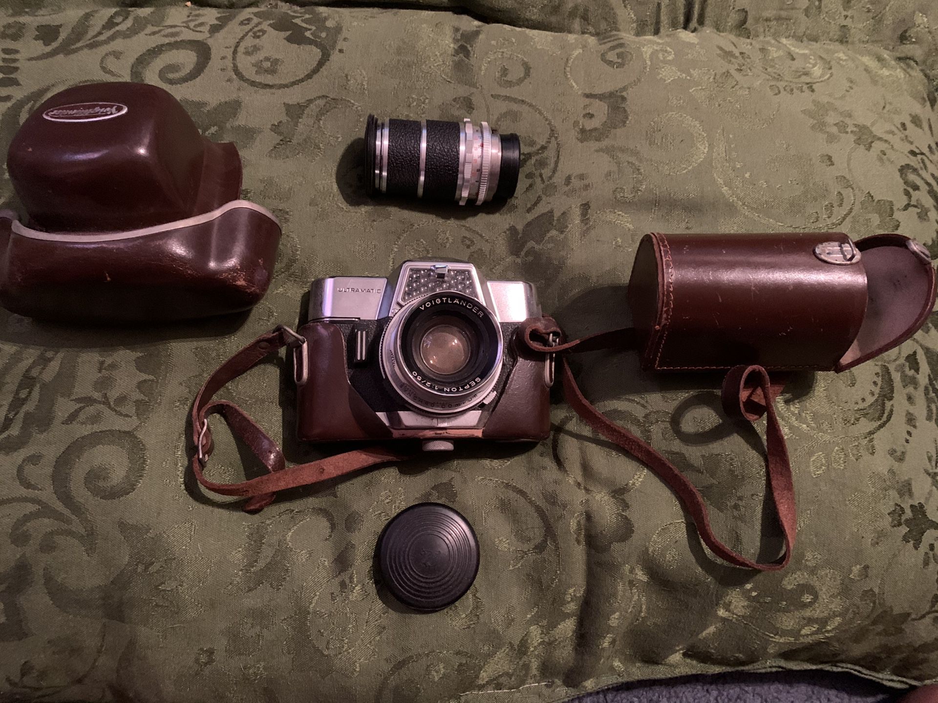 Antique camera and leather carrying case