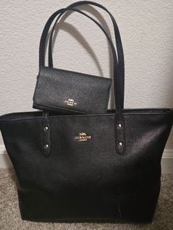 Authentic Coach purse and wallet. Purchased from the coach store at vintage mall
