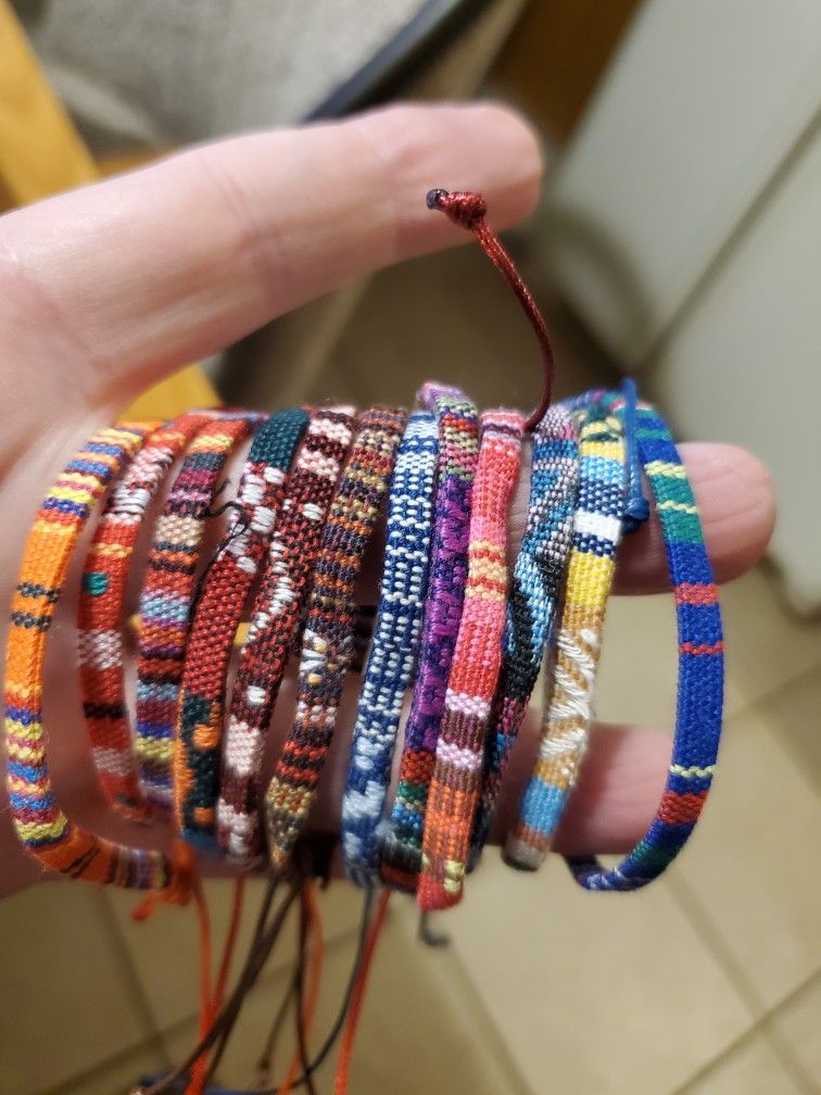 12 PIECE BRAIDED BRACELET SET NEW IN PLASTIC FREE SHIPPING