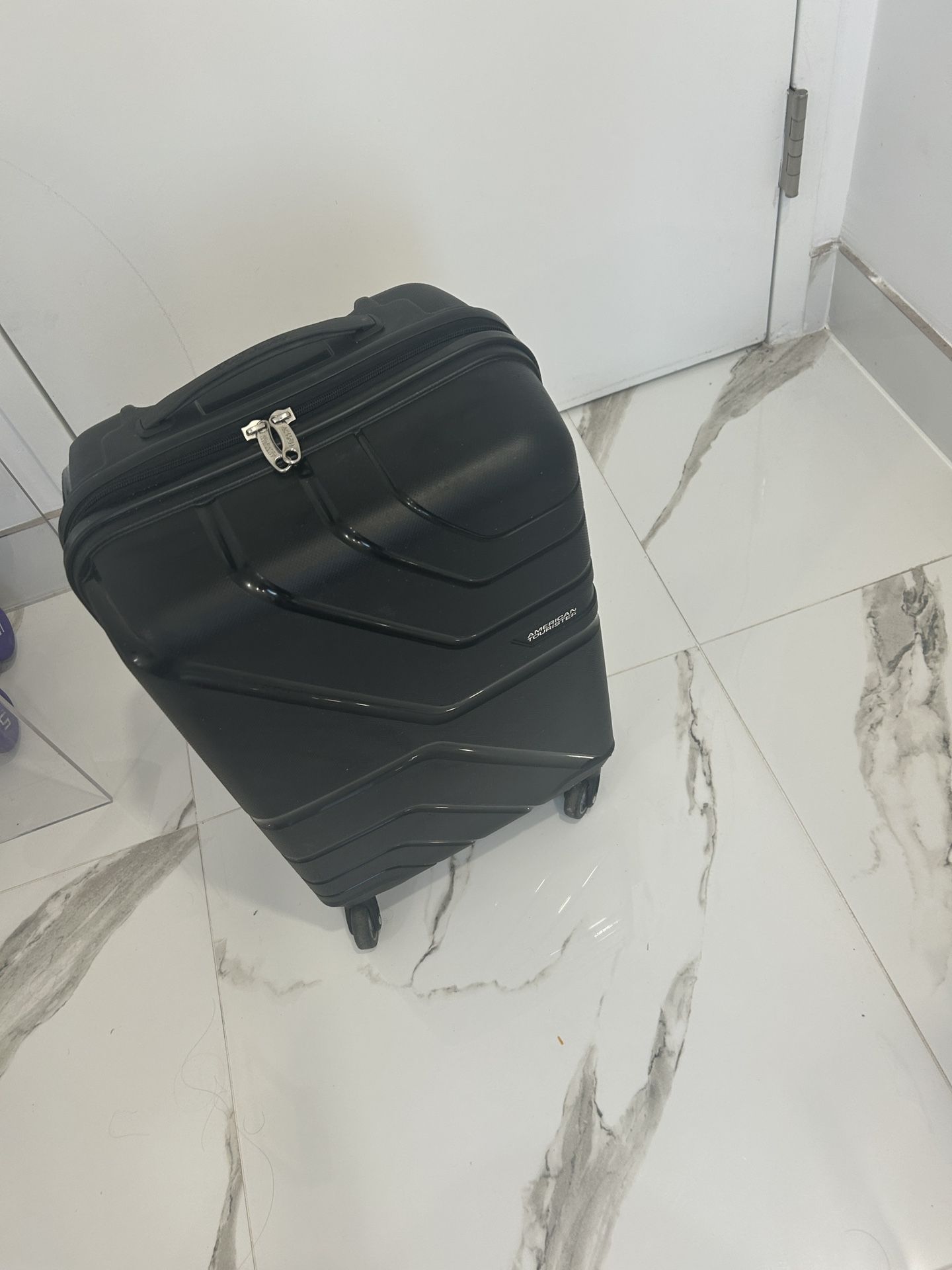 American Tourister Carry On Luggage
