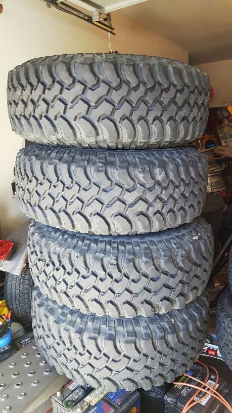 Selling a set of 4 used wheels and mud tires 35X12.50R16.50 BfGoodrich Mud-Terrain with lots of tread left.