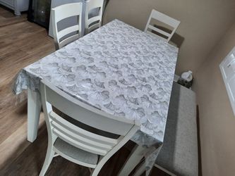 Dining table and 4 chairs and bench, very clean