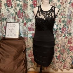 #230-Black Mini Dress. Sequin Hearts. Size 9. 