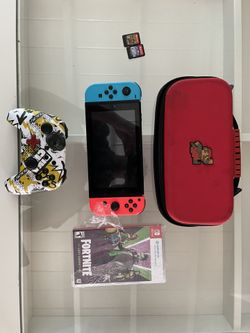 Nintendo Switch With Some Games And Controlers 
