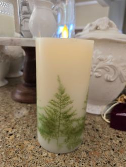 Set of three Luminara candles w/timer.  They work perfectly!