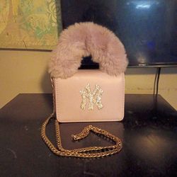 Mini cool purpled color handbag with fur handle