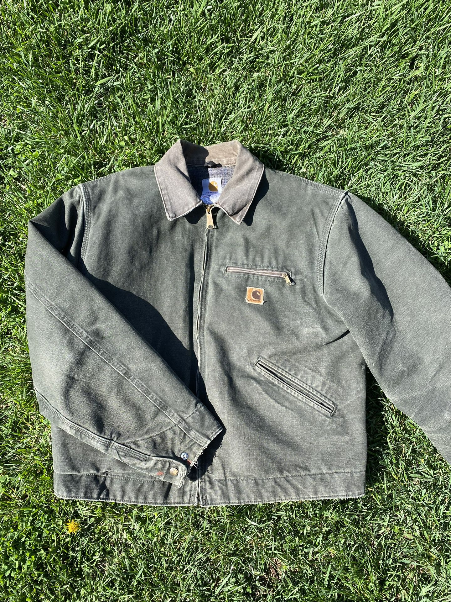 Green Carhartt detroit jacket lined with flannel. NEGOTIABLE! for