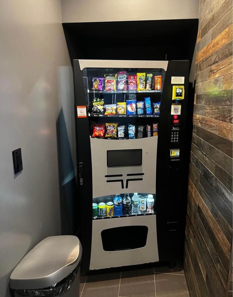 Vending machine compatible with credit card reader.