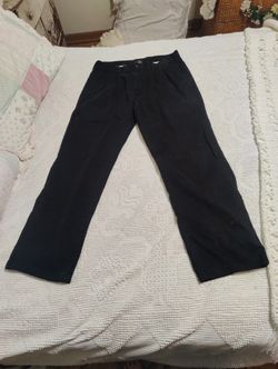 BLACK PLEATED FRONT W/POCKETS ,2 BACK POCKETS  34 X 32 BY GEORGE