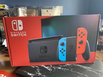Nintendo switch console with blue and red joy-con Brand New
