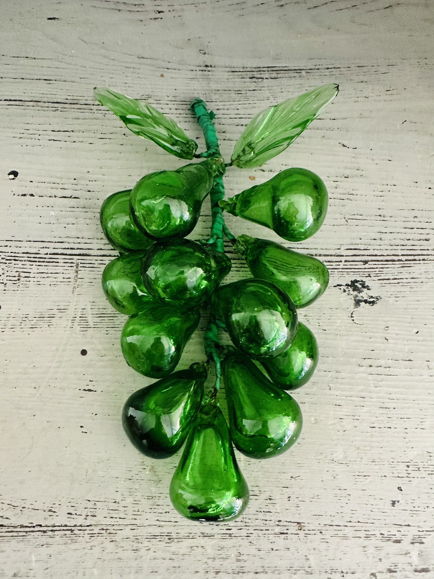 Vintage mid century Hand blown emerald green art glass grapes cluster. 10” long x 6” wide  12 grapes and two leaves . 